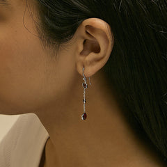 .925 Sterling Silver Graduating Bezel Set Red Garnet Dangle Earring
