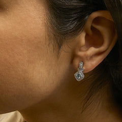 Sterling Silver Cushion Cut Blue Topaz and Diamond Accent Twist Motif Dangle Earrings