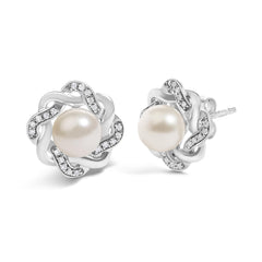 Sterling Silver Pearl and 1/10 Cttw Diamond Floral Twist Stud Earrings