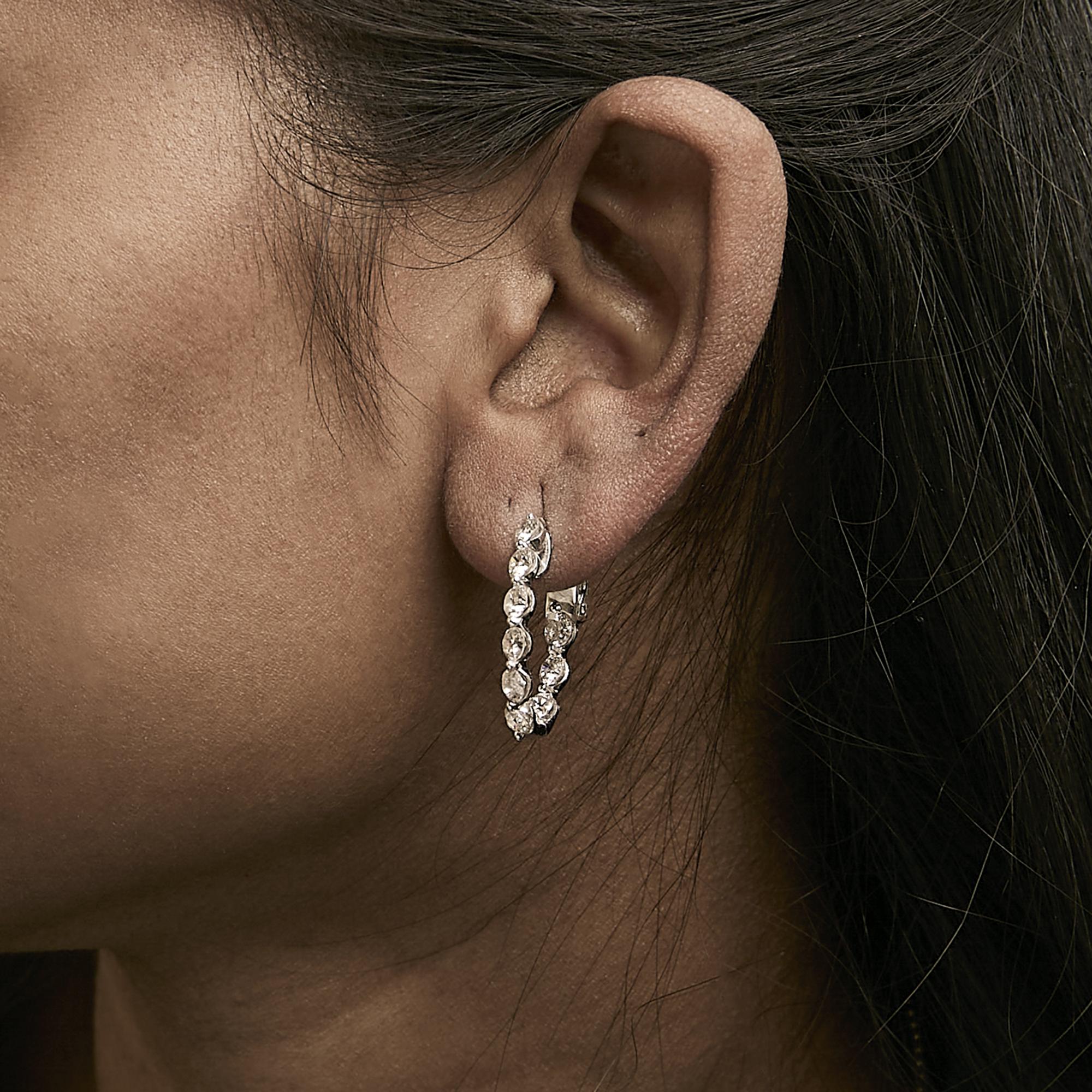 14K White Gold 3 3/4 Cttw Graduating Diamond Oval Hoop Earrings