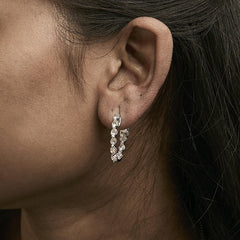 14K White Gold 3 3/4 Cttw Graduating Diamond Oval Hoop Earrings