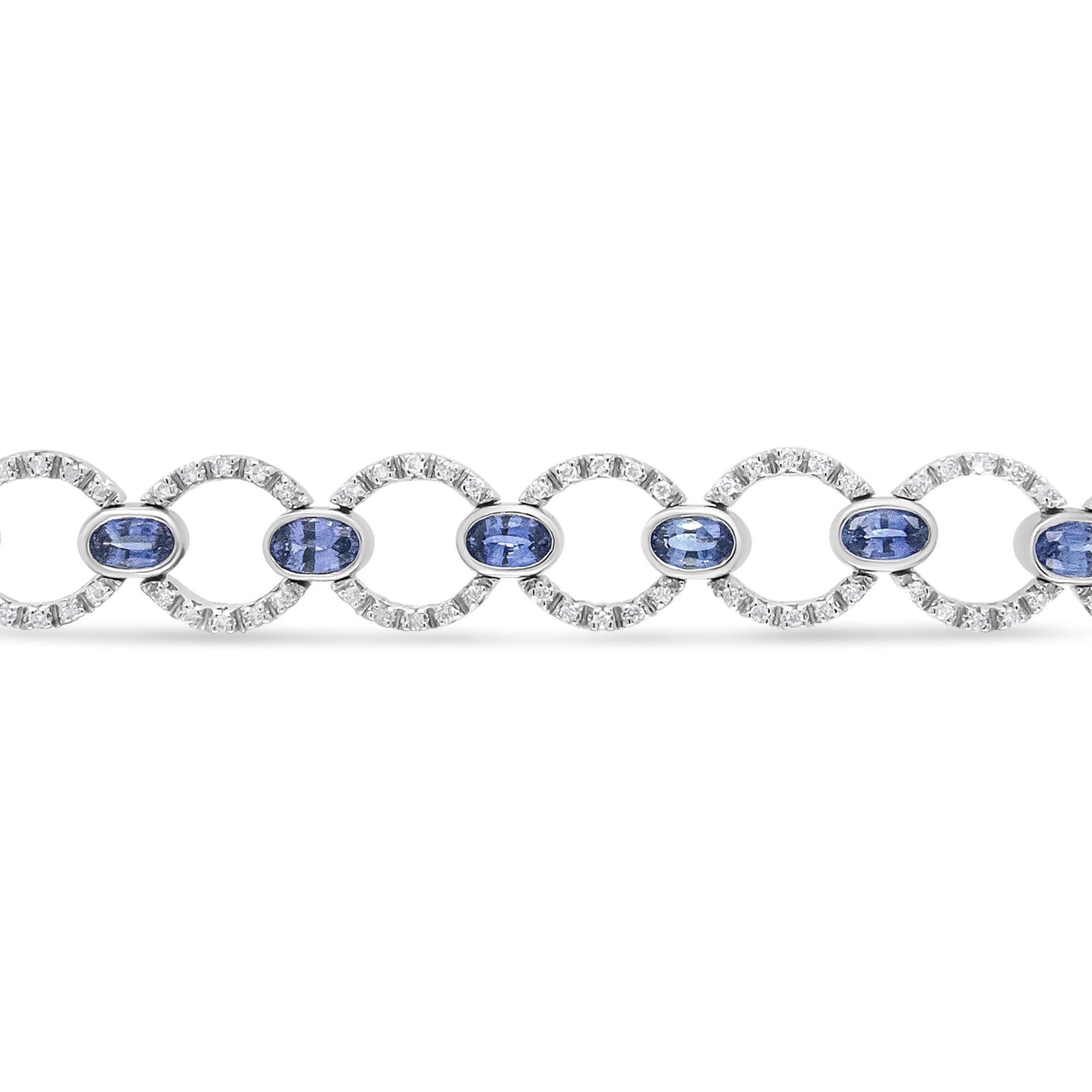 18K White Gold 6 Cttw Diamond and 5x3mm Oval Blue Sapphire Openwork Circle Link Bracelet (F-G Color, SI1-SI2 Clarity) - Size 7"