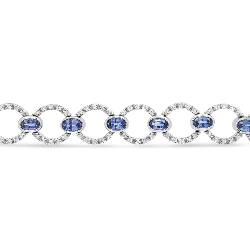 18K White Gold 6 Cttw Diamond and 5x3mm Oval Blue Sapphire Openwork Circle Link Bracelet (F-G Color, SI1-SI2 Clarity) - Size 7"